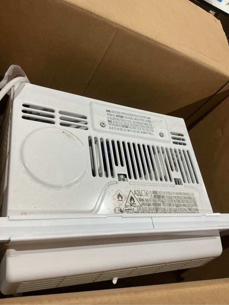 Condition photo showing As Is for amazon basics 5000-btu small window air conditioner, up to 150 sqf, window ac units with cool and fan functions, washable filter, adjustable window kit, intuitive mechanical controls, white white 5000 btu
