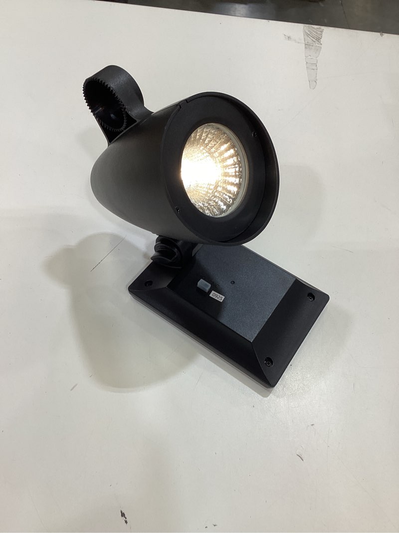 Condition photo showing As Is for harbor breeze 60 -lumens 1 -watt black solar led spot light