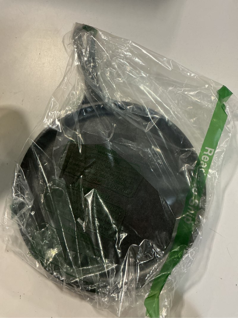 Condition photo showing New/Like New for Lodge L9OG3 Cast Iron Round Griddle, Pre-Seasoned, 10.5-inch - Made in USA, Compatible with Stovetop, Oven, Grill & Campfire