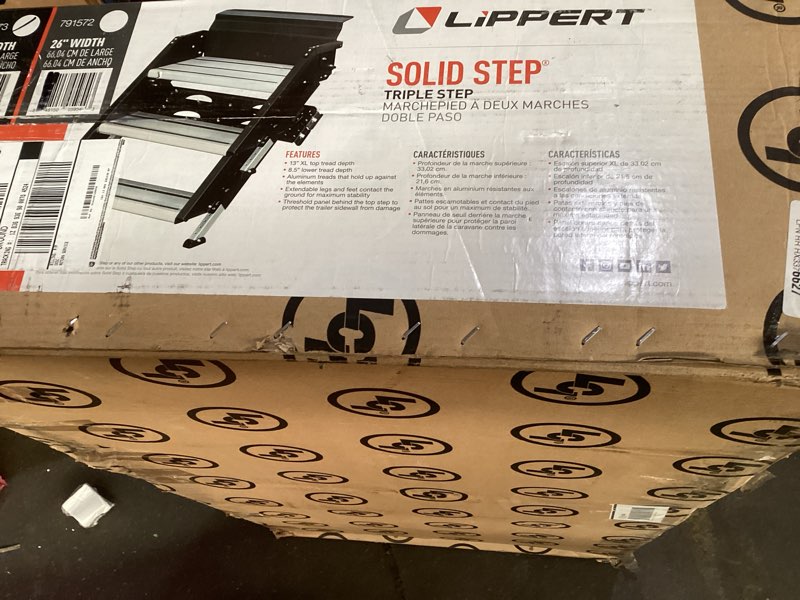 Condition photo showing As Is for Lippert-791573 Solid Step Triple Step for RV and Travel Trailer Entry Doorway , 30-inch,Black Triple Double Step 30-inch