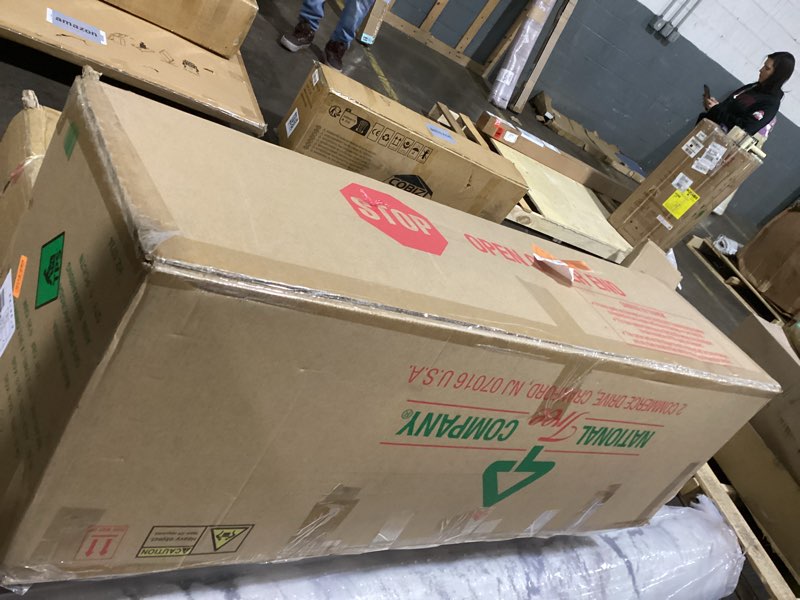 Condition photo showing Good Condition for National Tree Company 7.5 ft Pre-Lit Carolina Pine Artificial Christmas Tree, 750 Clear Lights, 1,399 Tips, Includes Stand, Green 7ft 6in Green