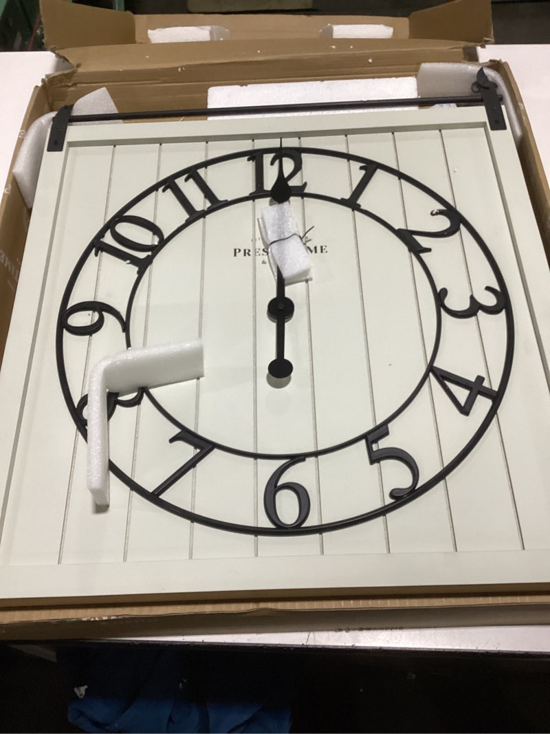 Condition photo showing Good Condition for Presentime & Co Farmhouse Barn Door Clock, Shiplap Style, Cream White Color, Silent No Ticking, 3D Arabic Numeral, 23" H x 21" W. Home Decoration/Wall Decoration/Farmhouse Décor.