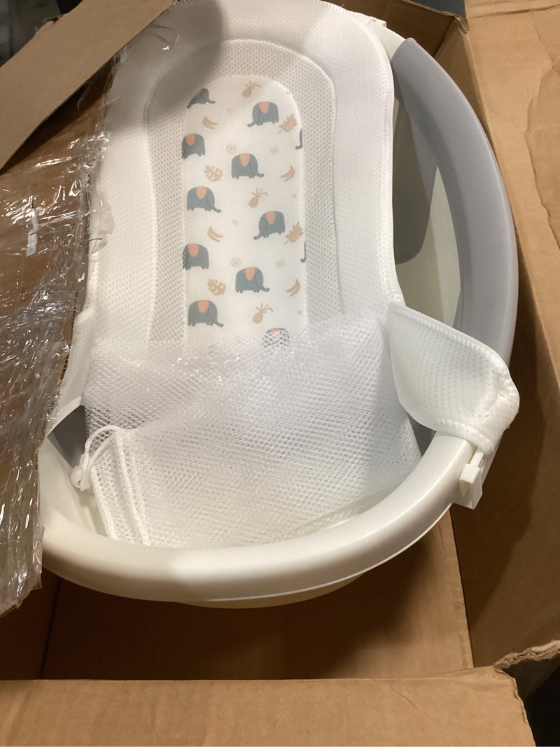 Condition photo showing Good Condition for collapsible baby bathtub with soft cushion and thermometer, newborn to toddler tub 0-36 months with toy storage mesh bag, portable travel bath for infants (grey)
