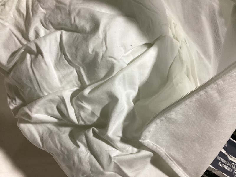 Condition photo showing As Is for organic cotton sateen comforter