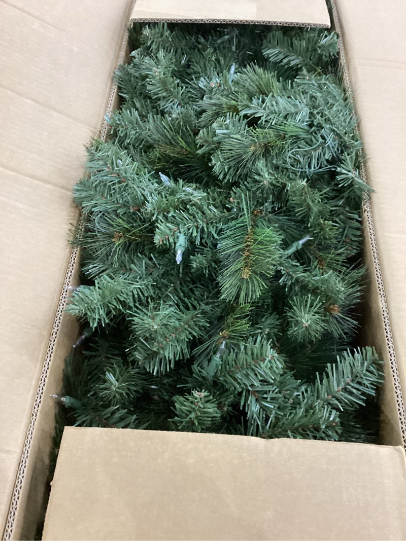 Condition photo showing New/Like New for National Tree Company 7.5 ft Pre-Lit North Valley Spruce Artificial Christmas Tree, 550 Multicolor Lights, 1,346 Tips, Includes Stand, Green