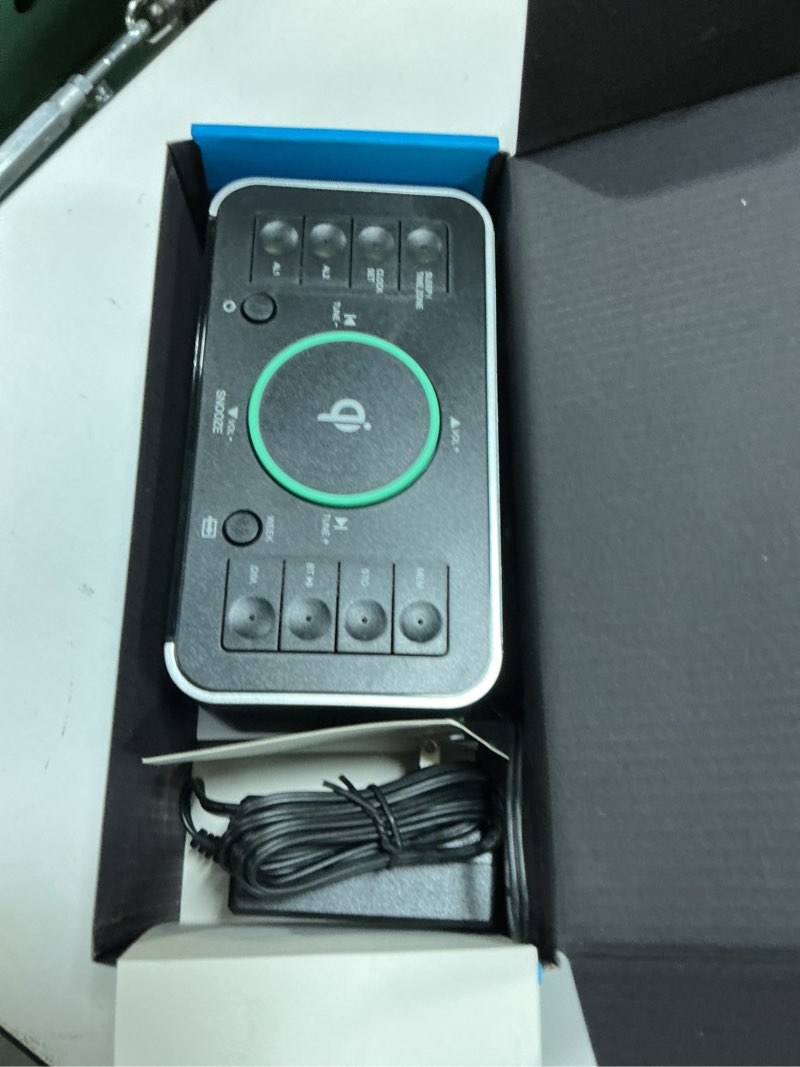 Condition photo showing As Is for emerson smartset wireless charging dual alarm clock radio, bluetooth speaker, usb, 1.4" aqua led display, er100202