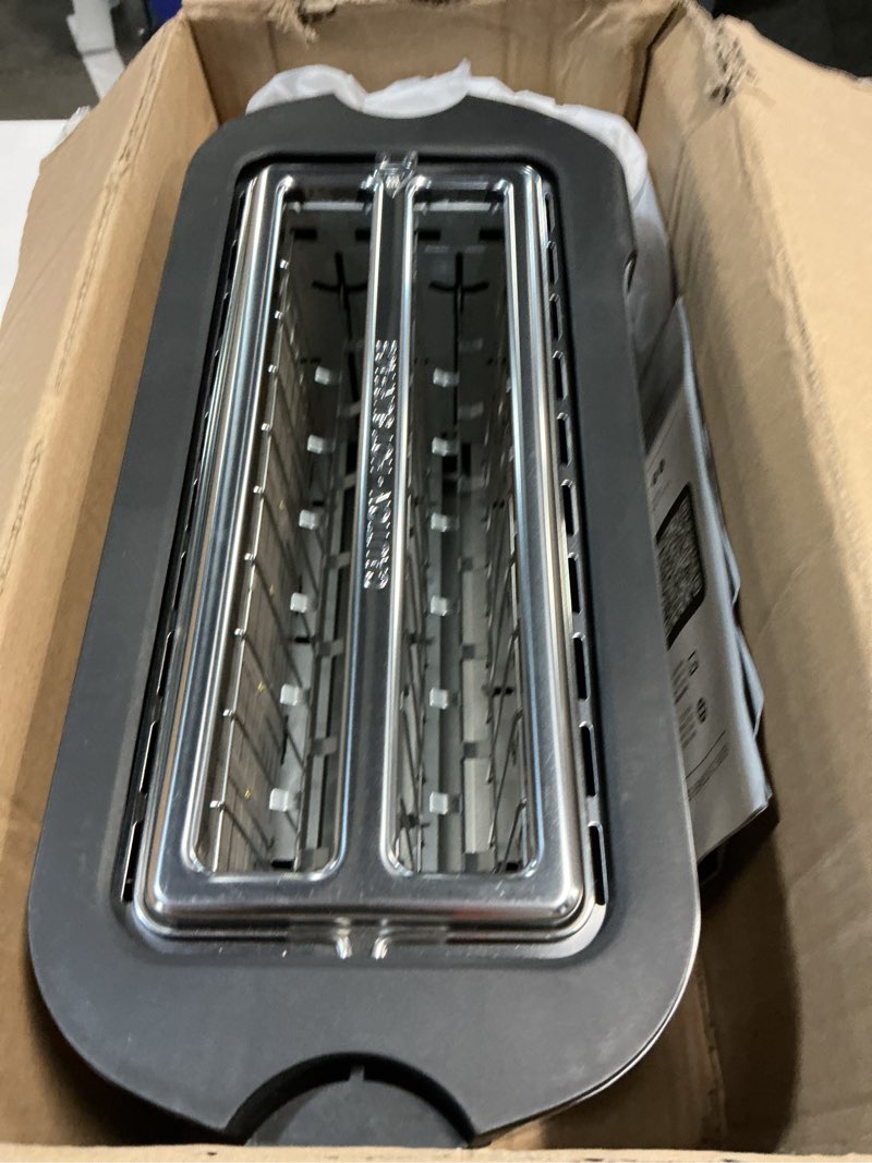 Condition photo showing As Is for elite gourmet ect-3100 long slot 4 slice toaster, reheat, 6 toast settings, defrost, cancel functions, built-in warming rack, extra wide slots for bagels & waffles, stainless steel & black