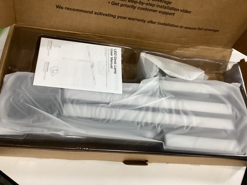 Condition photo showing Good Condition for ONEMIX 42" LED Desk Lamp with Clamp, Architect Desk Light with Remote, Adjustable 4-Segment Bar, 1800LM Bright, Eye-Caring Desk Lamp for Home Office, Reading, Study, Dual Monitors, Workbench (Black)