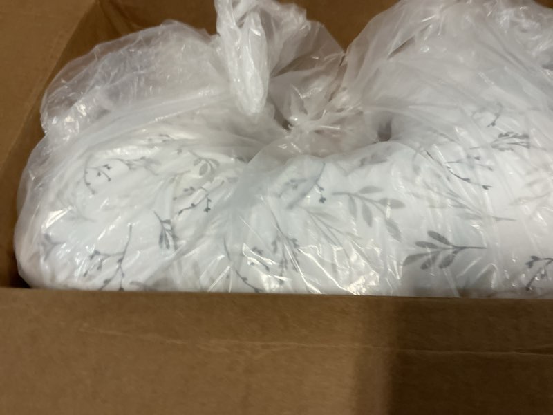 Condition photo showing Good Condition for Boppy Nursing Pillow - Firm, Ergonomic U-Shaped Bottle and Breastfeeding Pillow with High Lift for Comfort and Support, Spacious Surface - Gray Gentle Leaves New Nursing Pillow Gray Gentle Leaves