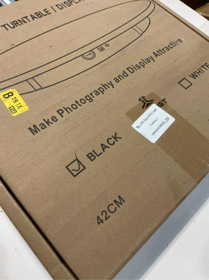 Condition photo showing Good Condition for JAYEGT Motorized Rotating Display Stand, 350Lbs Load?360 Degree Electric Rotating Potography Turntable for Products Display?Live Show? Remote Control +5 Colors Backgrounds (Black/16.5inch /Wired)