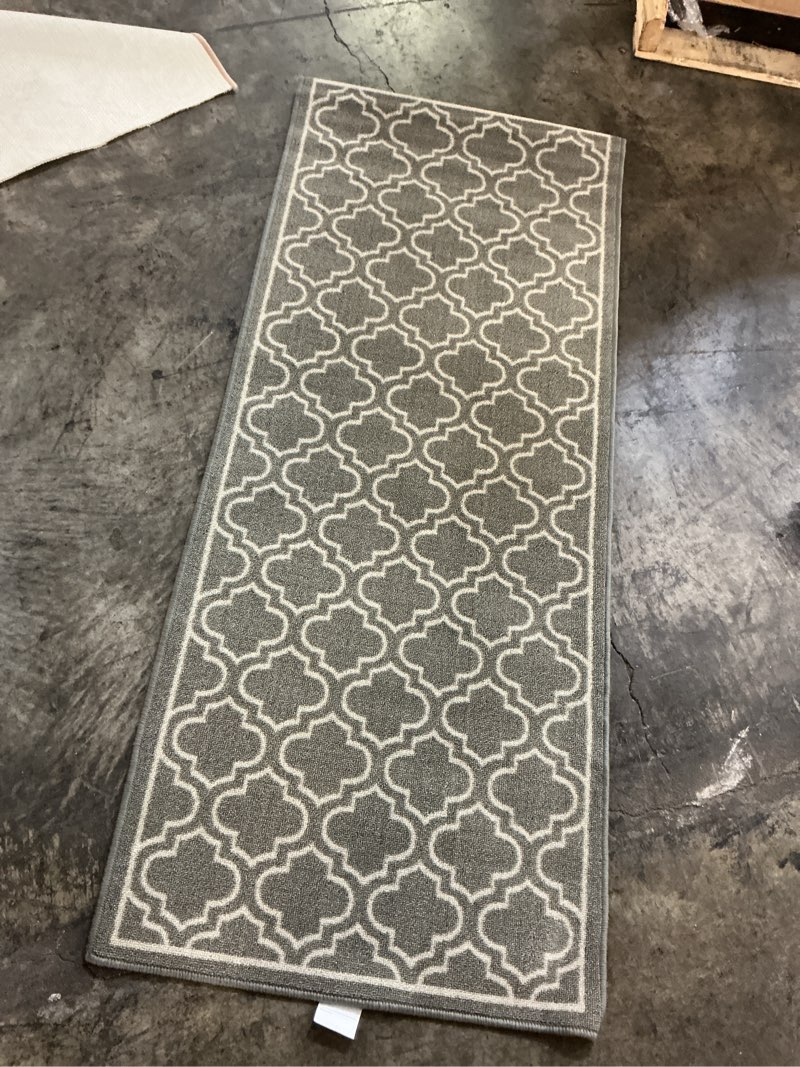 Condition photo showing As Is for trellis grey  doormat 2 ft. x 5 ft. accent rug