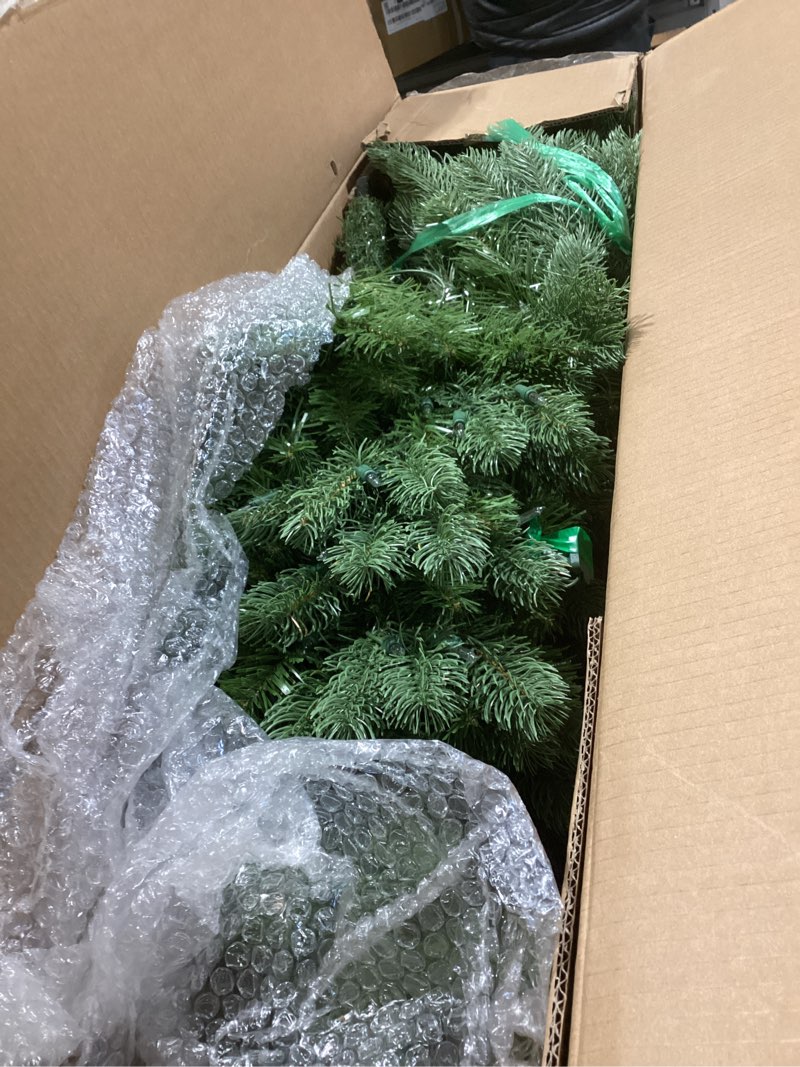 Condition photo showing Good Condition for National Tree Company 4.5 ft Pre-Lit Downswept Douglas Fir Artificial Christmas Tree, 450 Clear Lights, 525 Tips, Includes Stand, Green 4ft 6in Christmas Tree