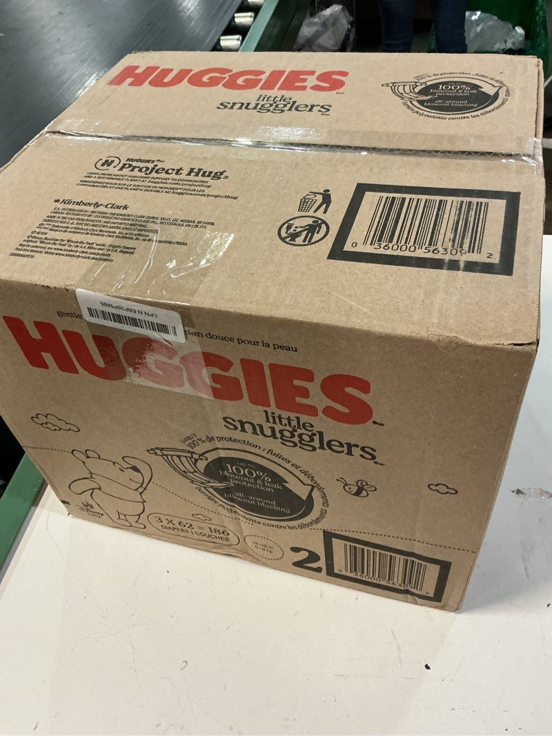 Condition photo showing New/Like New for huggies size 2 diapers, little snugglers baby diapers, size 2 (12-18 lbs), 186 count (3 packs of 62), packaging may vary size 2 186