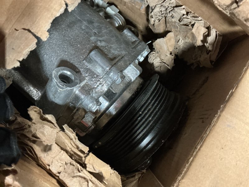 Condition photo showing As Is for uac co 2486ac a/c compressor