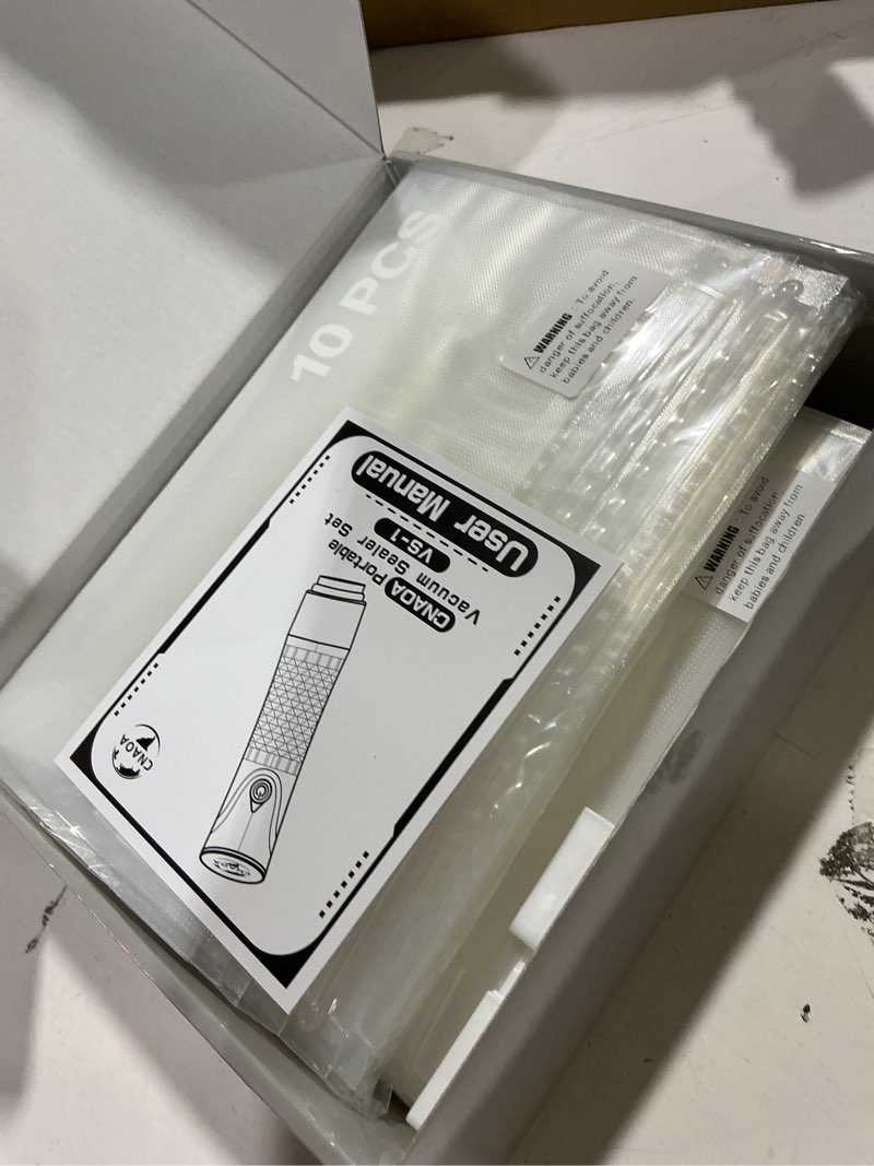 Condition photo showing Good Condition for CNAOA Compact Vacuum Sealer for Food with 30 Reusable Bags – Portable Vacuum Sealer Machine, Food Vacuum Sealer Handheld, Keep Meals Fresh Up to 6X Longer, Easy Storage & Travel Friendly - White-I