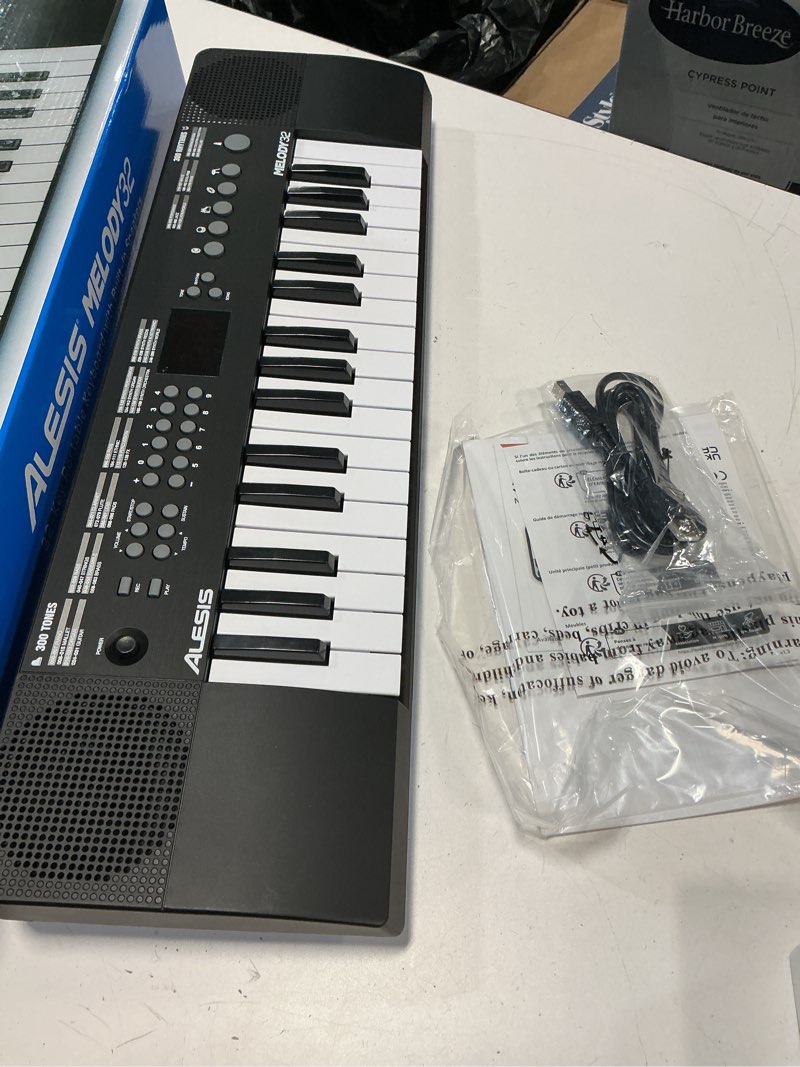 Condition photo showing New/Like New for alesis melody 32 - electric keyboard digital piano with 32 keys, speakers, 300 sounds, 300 rhythms, 40 songs, usb-midi connectivity and piano lessons