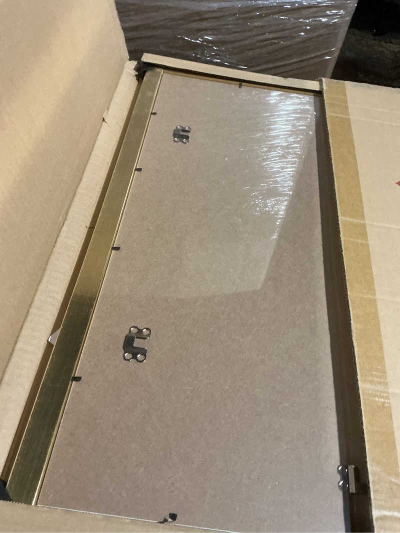 Condition photo showing Good Condition for LaVie Home 20x24 Picture Frame Gold Poster Frame,Display Pictures 16x20 with Mat or 20x24 Without Mat, Stable and Sturdy Frame and Polished Plexiglass, Horizontal and Vertical Format of The Walls 20x24 Gold