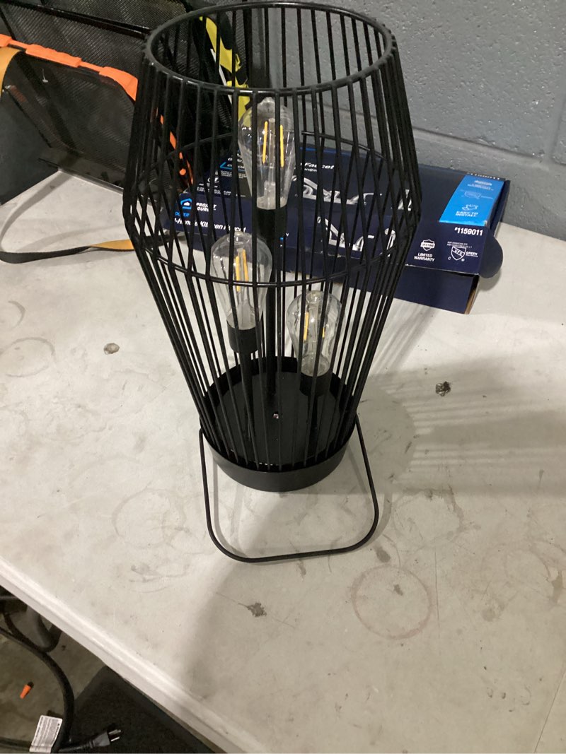 Condition photo showing As Is for style selections 8.5-in x 15-in black metal solar outdoor decorative lantern