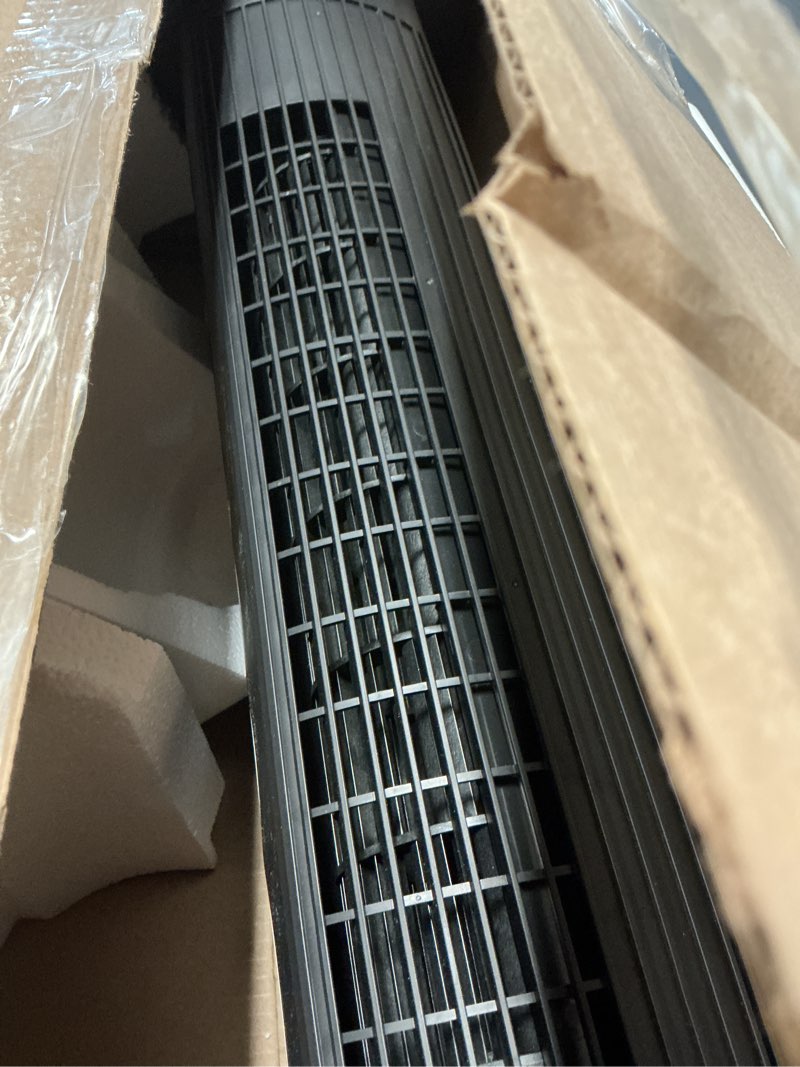 Condition photo showing As Is for amazon basics 28" 60-degree oscillating tower fan with powerful airflow for bedroom, living room, office, 3 speeds, mechanical control, air circulator, 35w, 27.8"h x 9.4"d x 9.4"w, black 28" - mechanical control