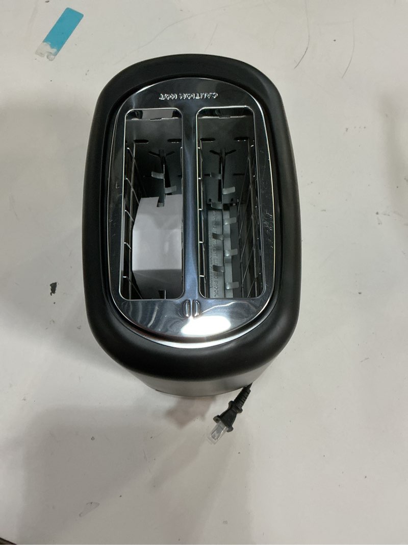 Condition photo showing Good Condition for Amazon Basics 2 Slice Toaster, With 6 Browning Settings, Extra Wide Slots For Bagels and Special Breads, Removable Easy-to-Clean Crumb Tray, Cancel/Defrost/Bagel Buttons, 900W, Black & Silver 2 Slice Silver Front