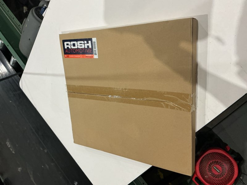 Condition photo showing As Is for aluminum automotive radiator and oil cooler combo unit manufactured by rosh automotive.