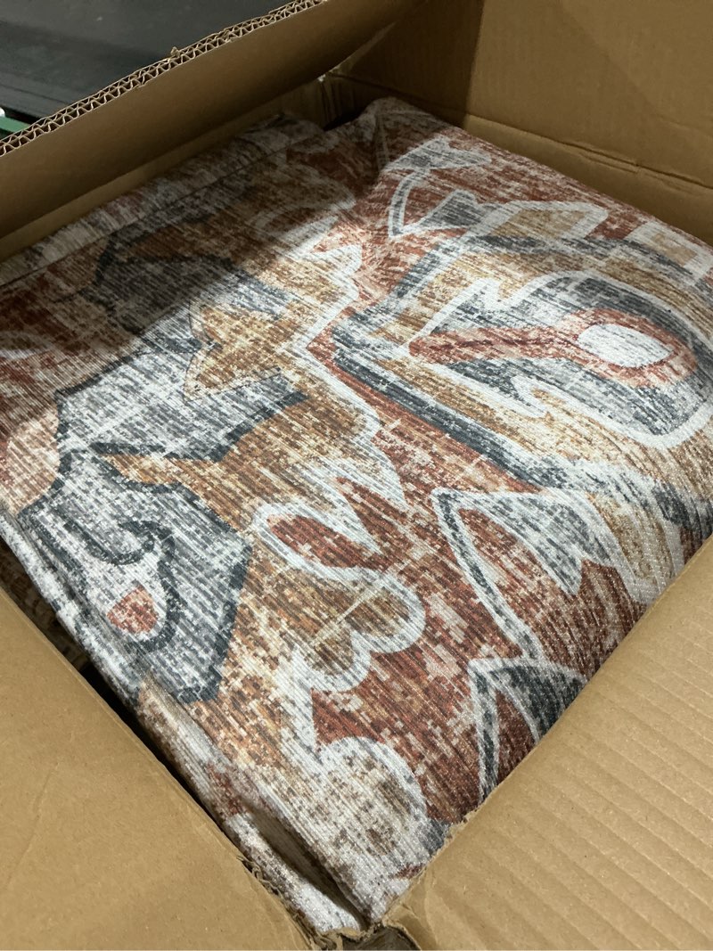 Condition photo showing Good Condition for Kokia Washable Area Rugs 9x12 Living Room Boho Non Slip Thin Carpet Stain Resistant Vintage Orange Printed Oriental Foldable Distressed Rug for Bedroom Indoor House 9'x12' (No Pile Tight) Orange/Cream/Affogato/Gray