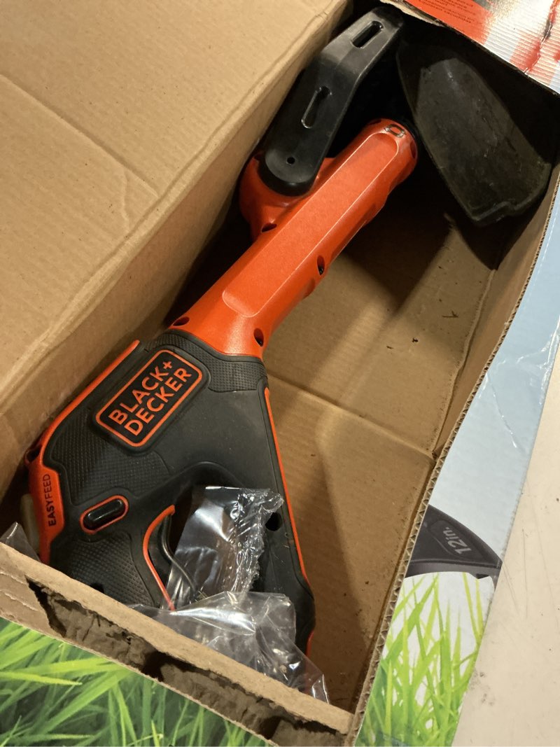 Condition photo showing As Is for black+decker 20v max 12 inch weed eater cordless string trimmer and wheeled edger lawn tool with spool, 2.5ah battery and charger included, lightweight, 2 speed powerdrive (lst522) 20v string trimmer kit