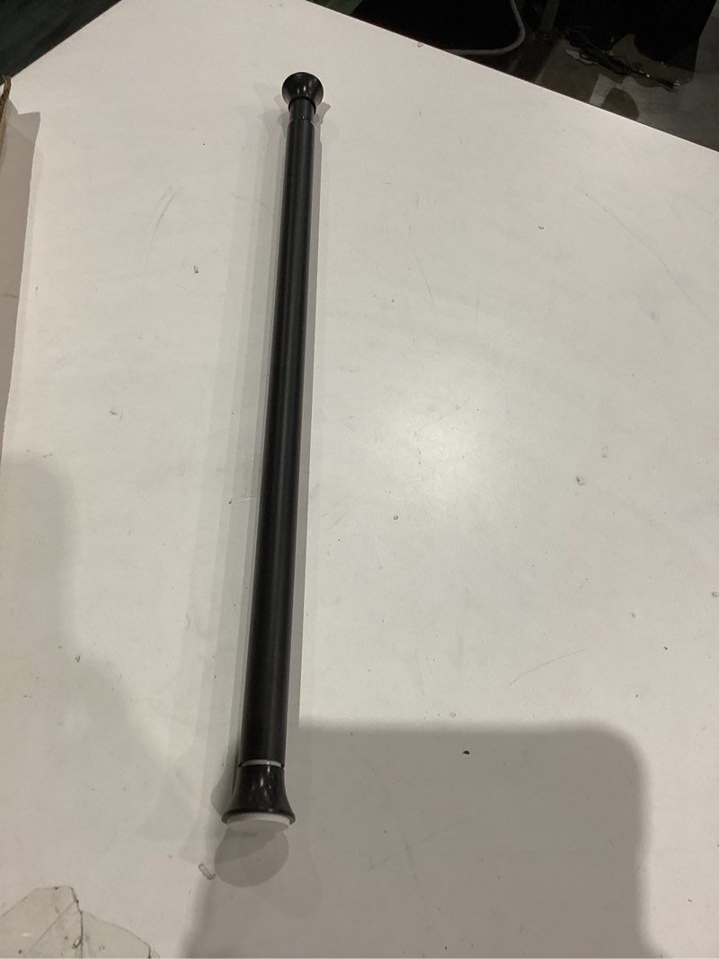 Condition photo showing Good Condition for Amazon Basics Tension Curtain Rod, Adjustable 24-36" Width - Black, Classic Finial Black 24-36" Indoor