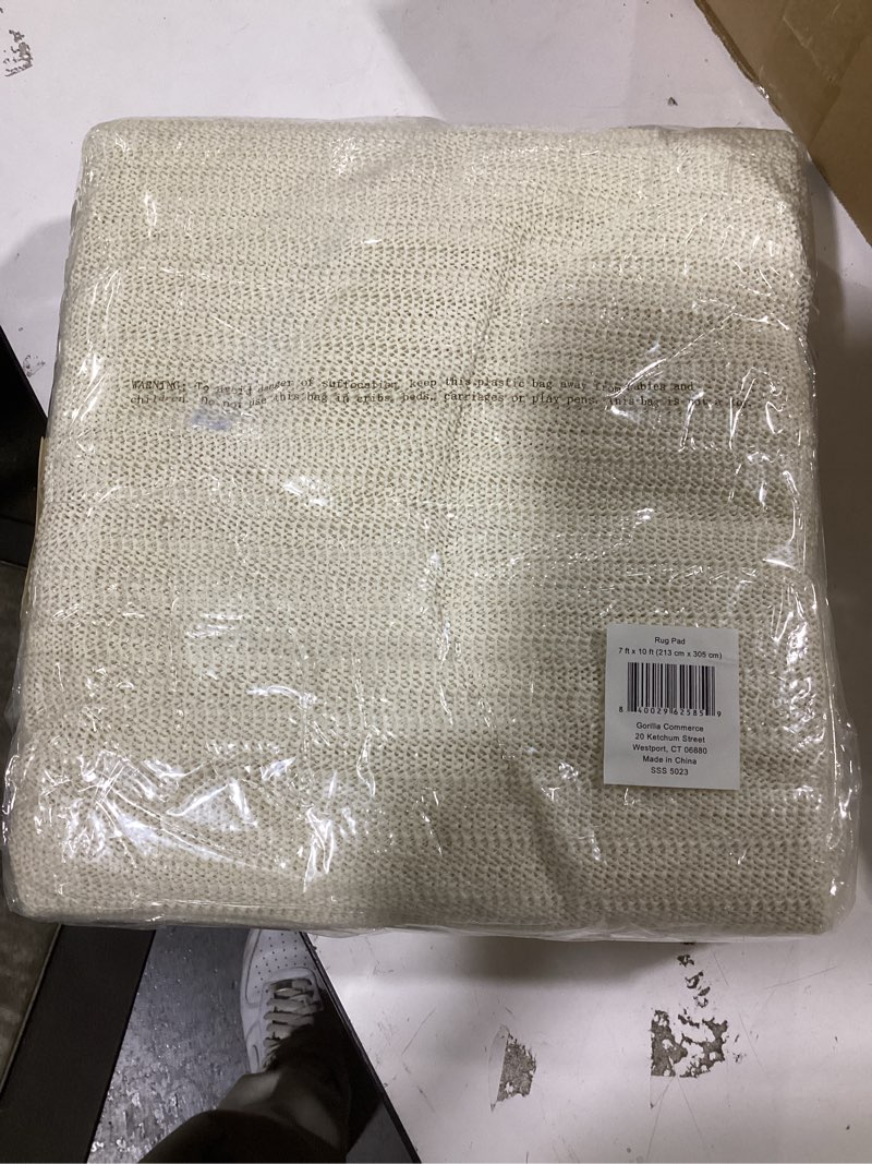 Condition photo showing New/Like New for Ninja Rug Gripper Pad for Hardwood Floors, 7x10 FT, Slip Resistant Grip Pads for Hard Surfaces, Adds Cushion Under Carpet and Maximum Protection, Keeps Area Rugs and Carpets Safe and in Place on Floor 7' x 10' (Rectangular) Traditional Pads for Hard Floors