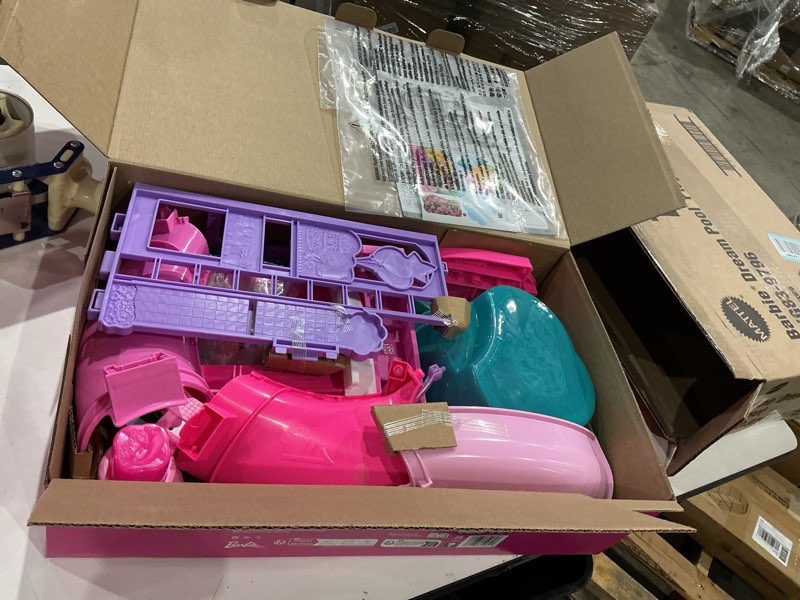 Condition photo showing As Is for barbie dream pool playset with 6 play areas, including slide & bubbling hot tub, plus 20+ accessories like pet, floaties & more