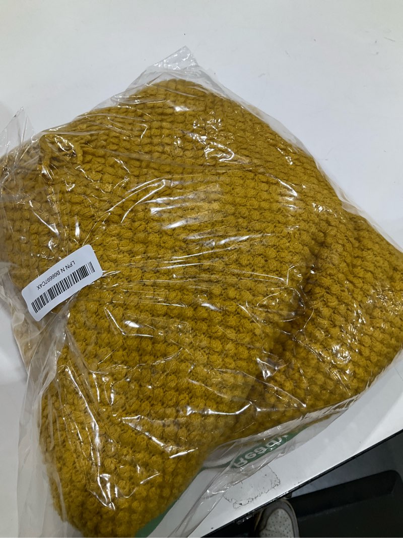 Condition photo showing item condition for LOMAO Knitted Throw Blanket with Tassels Bubble Textured Lightweight Throws for Couch Cover Home Decor (Mustard Yellow, 50x60) Mustard Yellow 50x60"