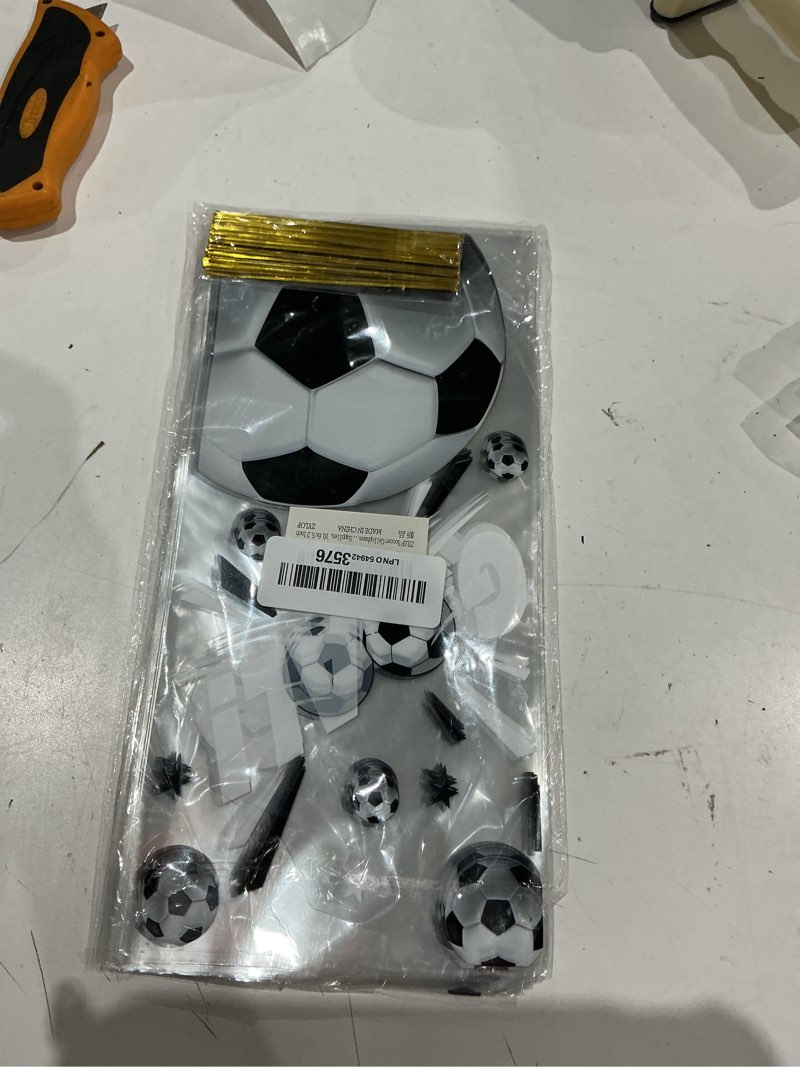 Condition photo showing Good Condition for zylop soccer cellophane treat bags, 50 pack 5.2 x 10.6 inch clear soccer goodie bags with 60 twist ties, goal design candy cookie snack bag for 2026 game day, birthday, team & school events soccer 50pcs