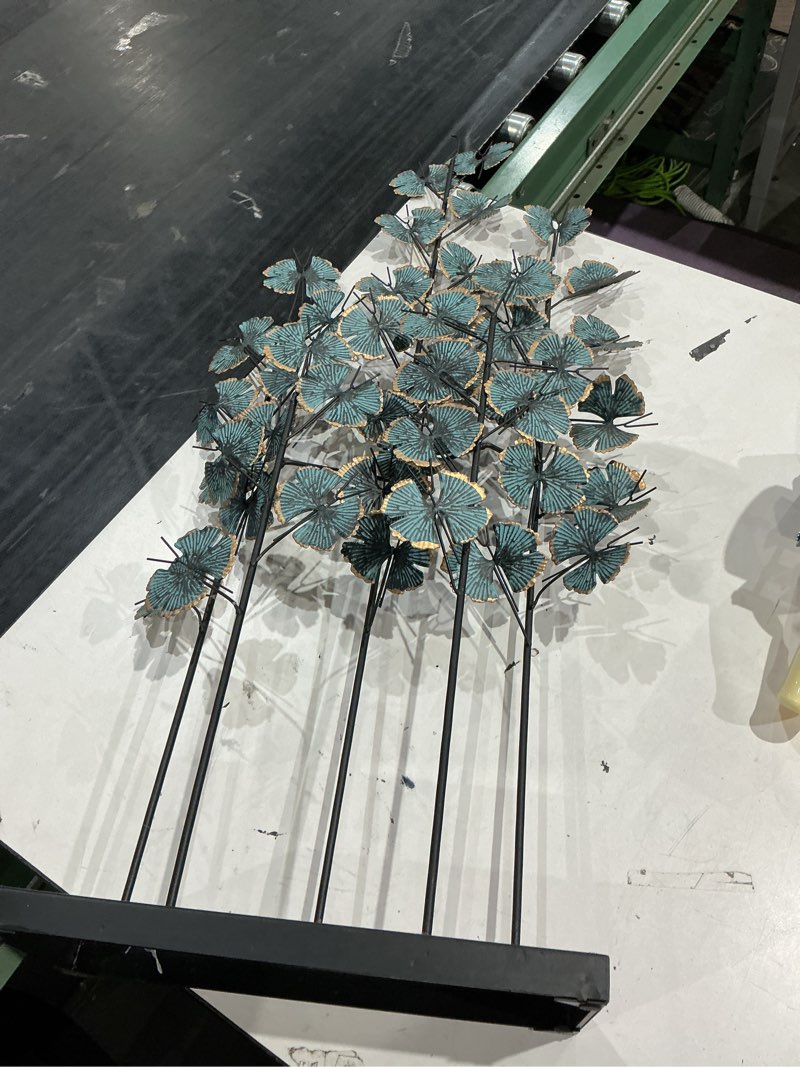 Condition photo showing As Is for deco 79 metal leaf sculpture with gold accents, 13" x 6" x 37", teal