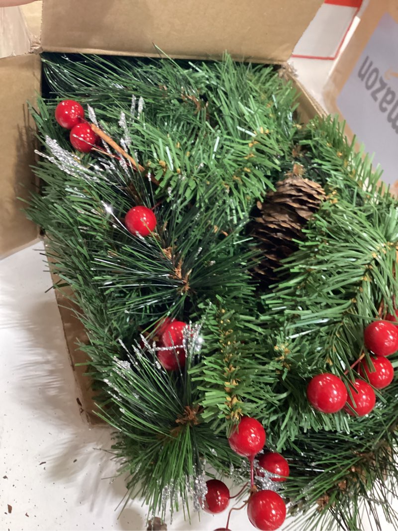 Condition photo showing Good Condition for national tree company 9 ft pre-lit crestwood spruce artificial christmas garland, christmas decoration with glitter, pinecones, red berries, 50 clear lights, 180 tips, green plug in tree