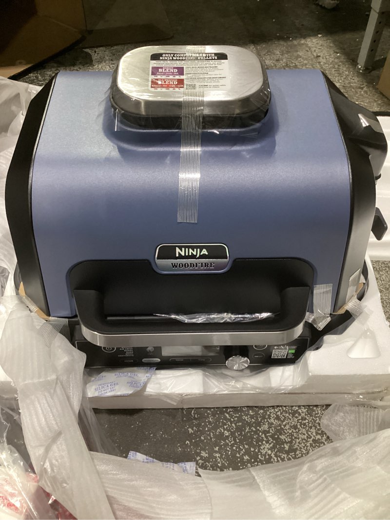 Condition photo showing Good Condition for ninja og951 woodfire pro connect premium xl outdoor grill & smoker, bluetooth, app enabled, 7-in-1 master grill, bbq smoker, outdoor air fryer, woodfire technology, 2 built-in thermometers, black/blue xl grill+thermometer+app connect