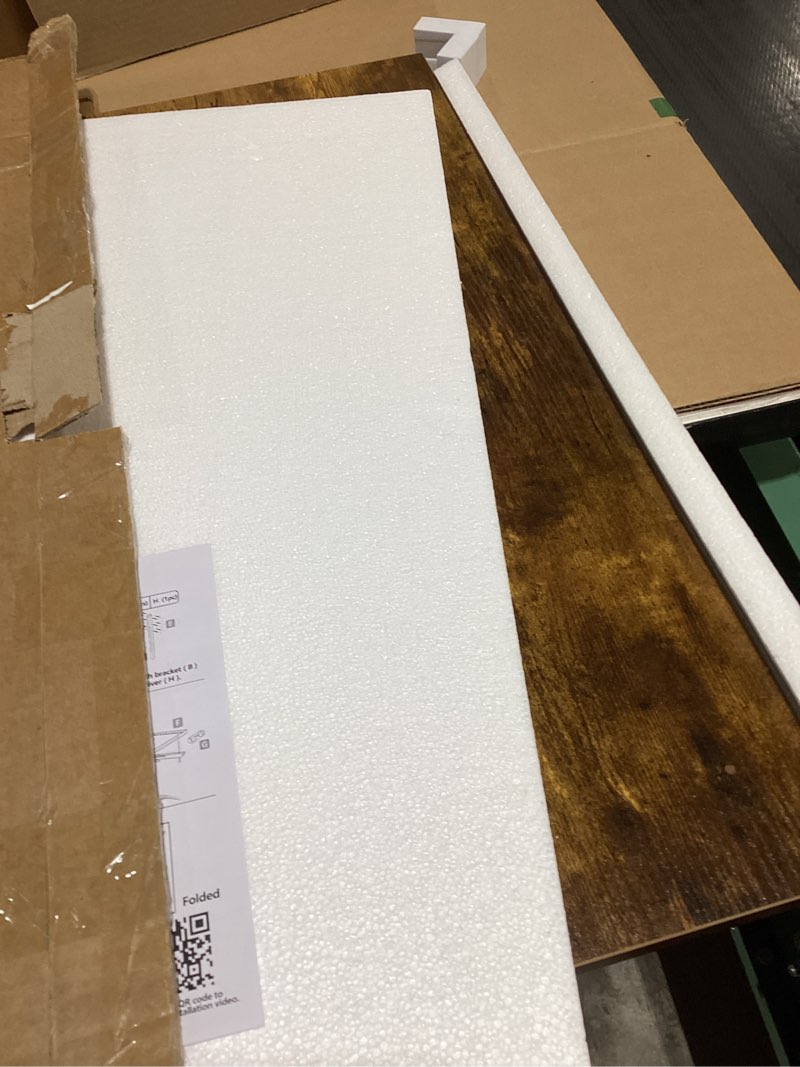 Condition photo showing New/Like New for GOYLSER Wall Mounted Folding Table Floating Desk for Small Spaces, Fold Down Laundry Wall Table with Brackets 25"x15.7" Rustic Brown