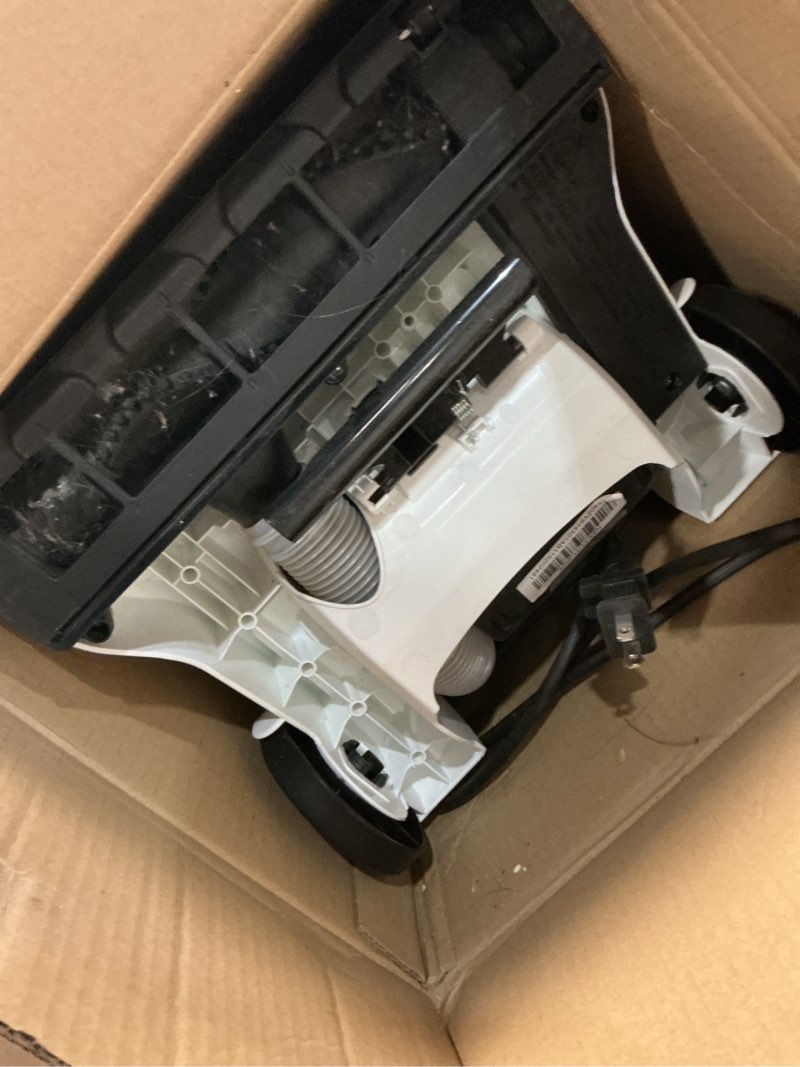 Condition photo showing As Is for amazon basics upright bagless lightweight vacuum cleaner, black and white