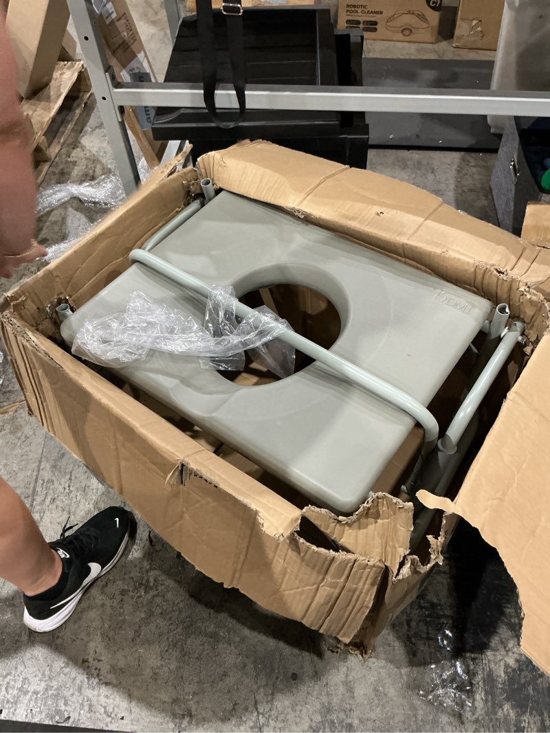 Condition photo showing As Is for hd drop-arm commode