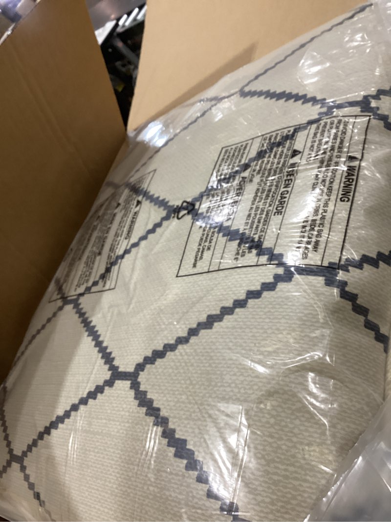 Condition photo showing As Is for arden outdoor deep seat cushion set 24 in x 24 in, weather-proof, rain-proof, fade resistant patio cushion for chair, sofa, and couch tan diamond trellis polyfill tan diamond trellis 4 pack