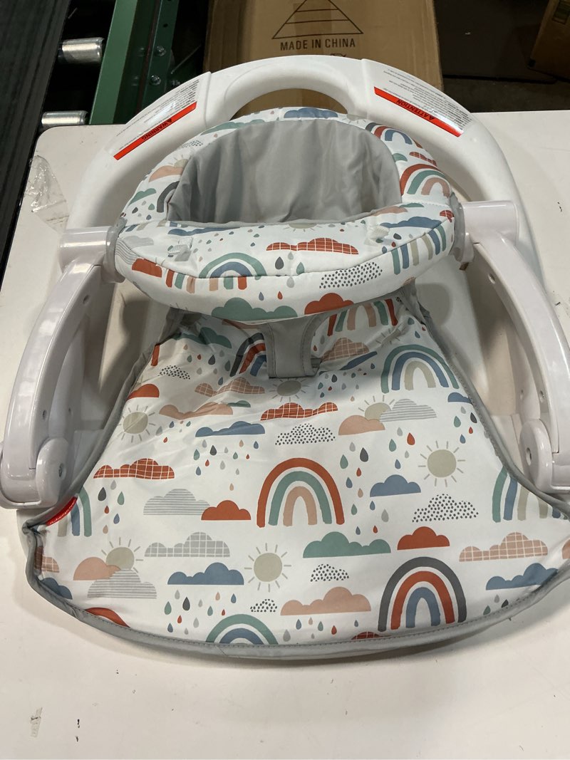 Condition photo showing As Is for fisher-price portable baby chair sit-me-up floor seat with developmental toys & machine washable seat pad, rainbow showers