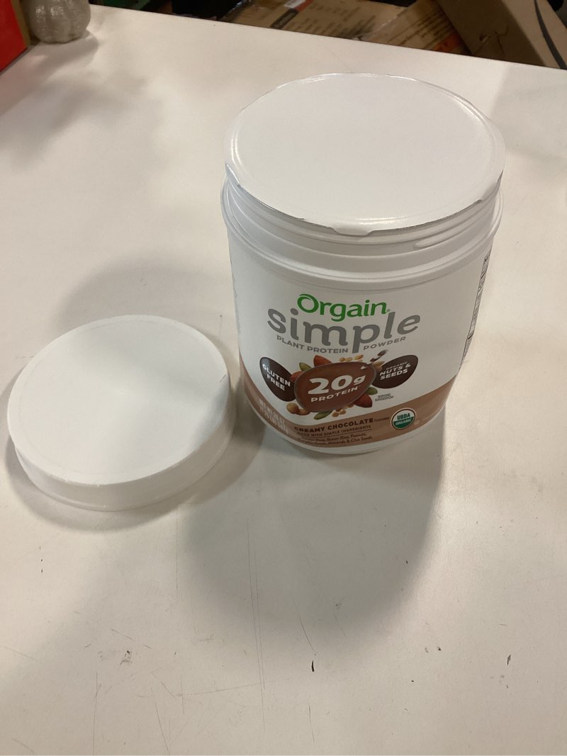 Condition photo showing New/Like New for (EXP 03/27/2027) Orgain Organic Simple Vegan Protein Powder, Chocolate - 20g Plant Based Protein, Made with less Ingredients, No Artificial Sweeteners, Gluten Free, No Dairy or Lactose, 1.25 lb (Packaging May Vary)