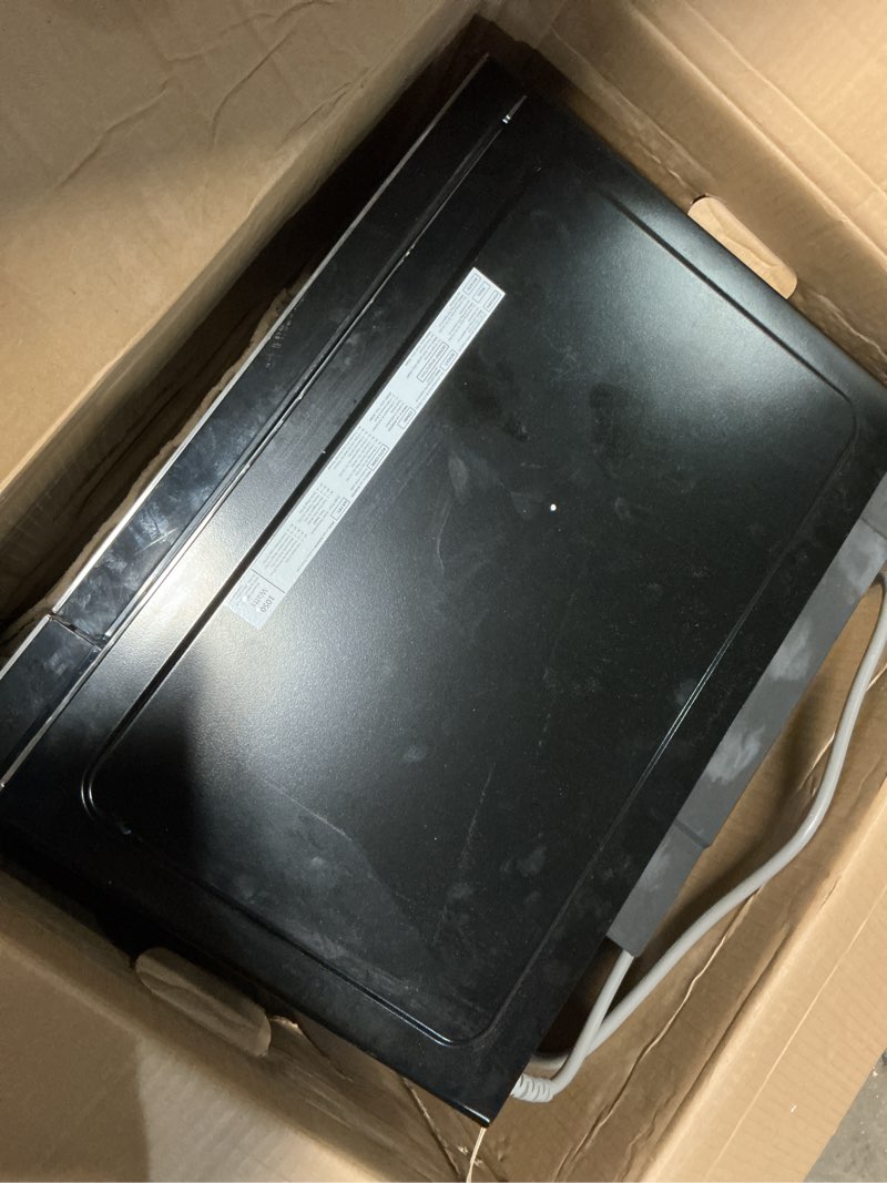 Condition photo showing As Is for ge gcst10a1wss 1.0 cu ft convection microwave oven, 1050w countertop air fry microwave with broil & crisper pan, compact stainless steel design