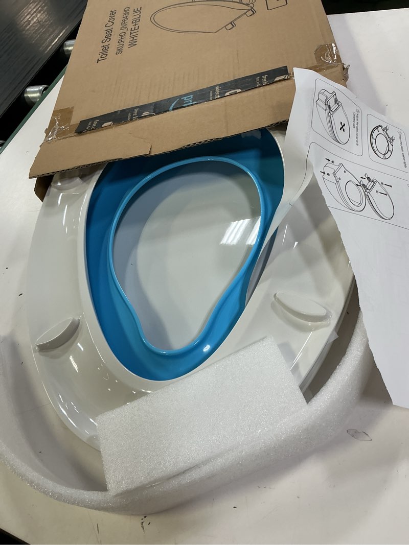 Condition photo showing Good Condition for toilet seat, elongated toilet seat with toddler seat built in, potty training toilet seat elongated fits both adult and child, with slow close and magnets- elongated white and blue blue elongated with toddler seat