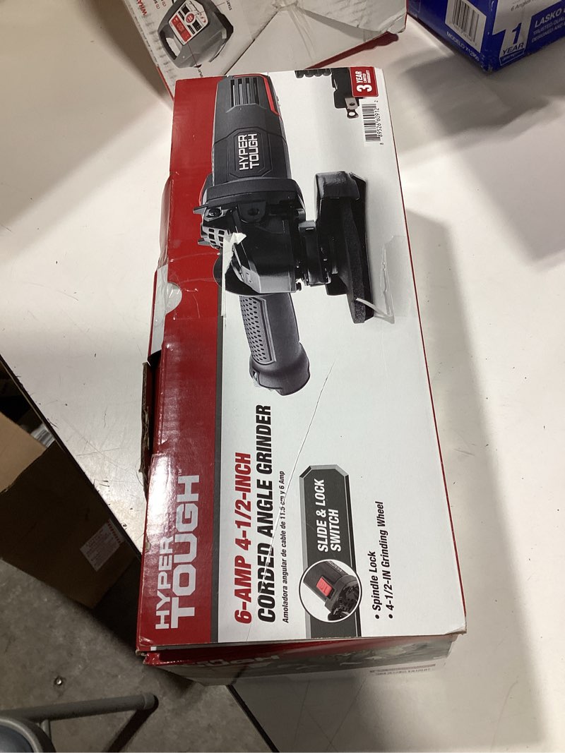 Condition photo showing As Is for ht 6a angle grinder with 6-amp motor, slide lock switch, and wheel guard