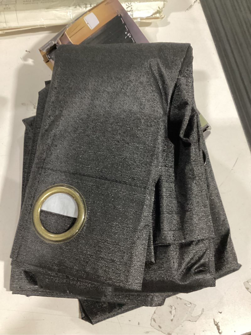 Condition photo showing Good Condition for sun zero bryant 2-piece textured thermal insulated 100% blackout grommet top curtain panel, black, 37”w x 84"l