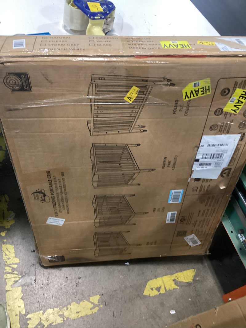 Condition photo showing New/Like New for dream on me 3-in-1 portable folding stationary side mini baby crib in natural & mattress, greenguard gold & bsa, use as changer & playpen, locking wheels, 3 mattress heights, extra firm mattress natural crib