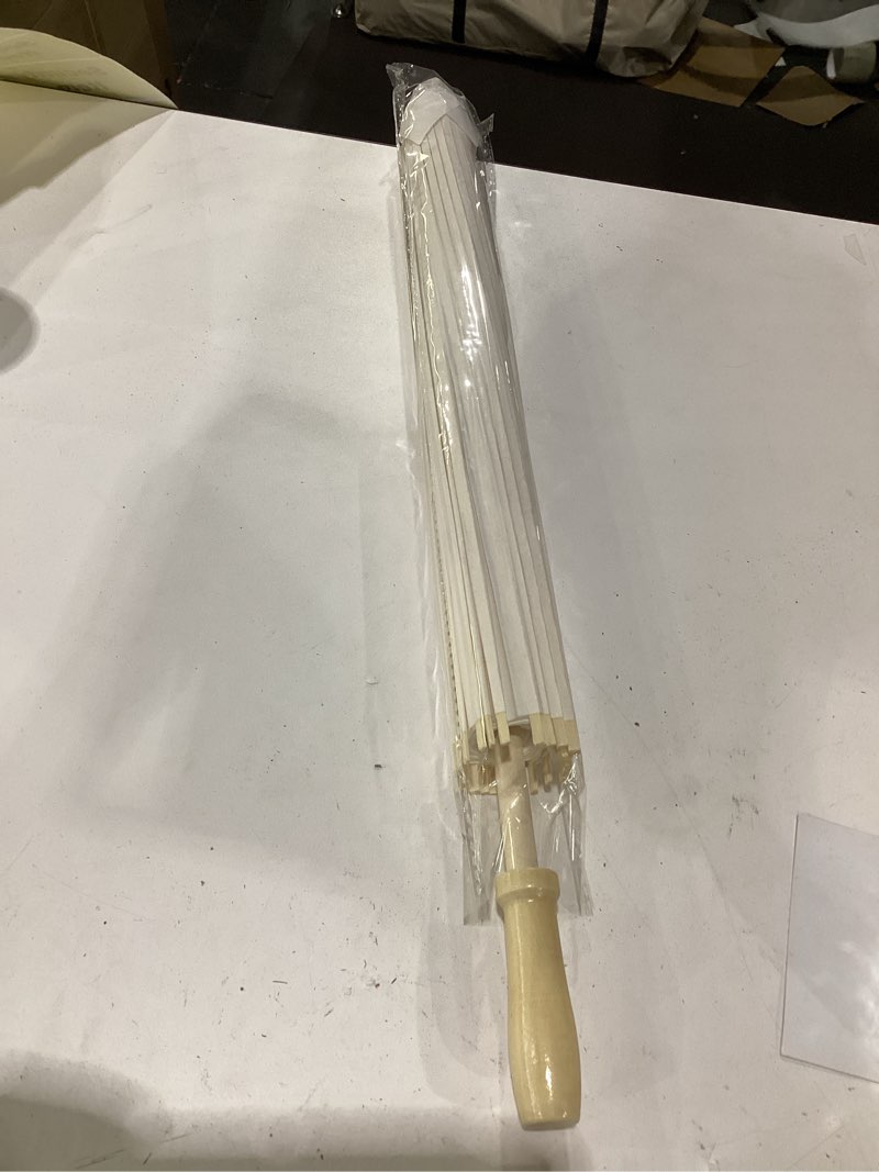 Condition photo showing Good Condition for decorative white paper parasol umbrella featuring bamboo ribs and wooden handle