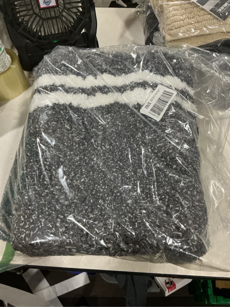 Condition photo showing Good Condition for purrugs bathroom rug non-slip machine washable 30" x 46", super absorbent and quick dry shaggy microfiber bath mat, extra soft and plush bath rug for bathtub, shower, and sink, charcoal charcoal 30" x 46"