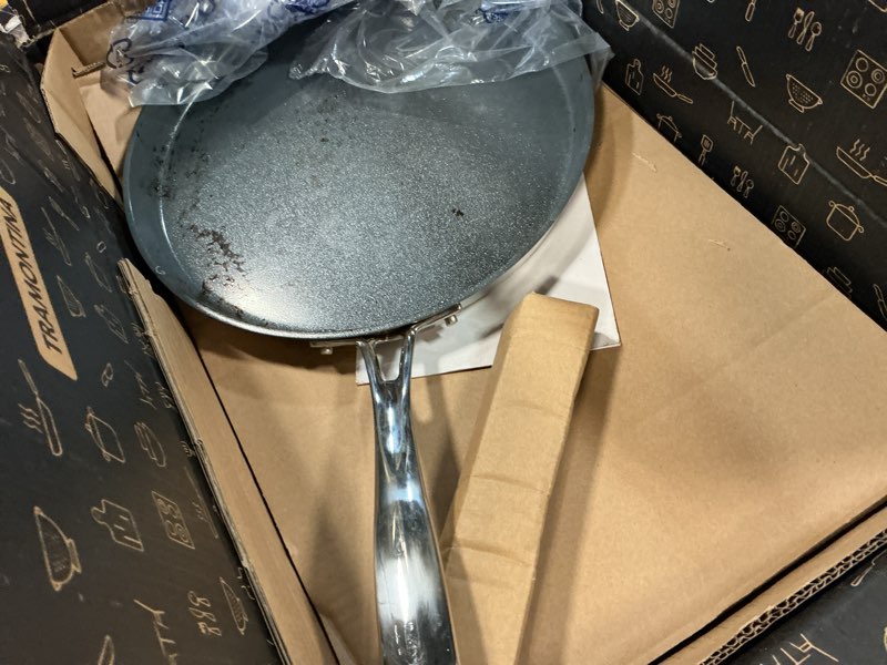 Condition photo showing As Is for tramontina utsava 11-inch tri-ply clad stainless steel ceramic-coated dosa tawa, non stick tava pan for roti, crepe pan, comales para tortillas, pancake griddle, nonstick flat skillet 11-inch (flat) stainless steel