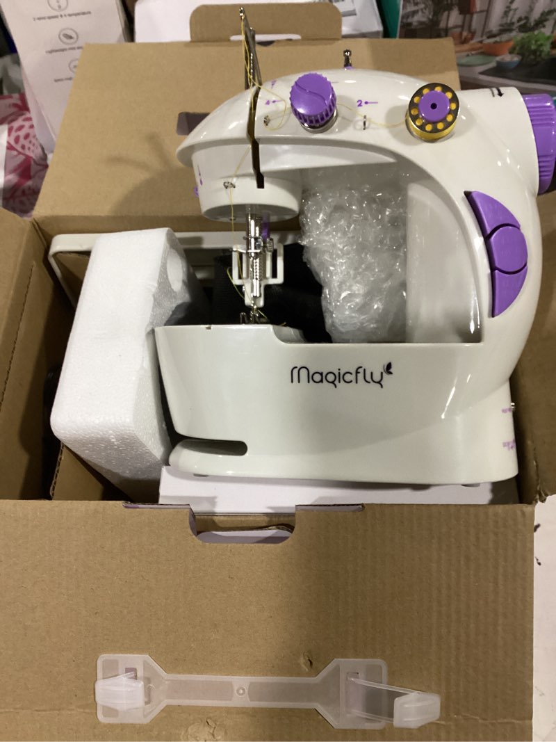 Condition photo showing Good Condition for magicfly mini sewing machine with extension table, dual speed portable sewing machine for beginners with light, sewing kit for household use, white